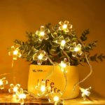 Flower string light with silicone lotus blooms