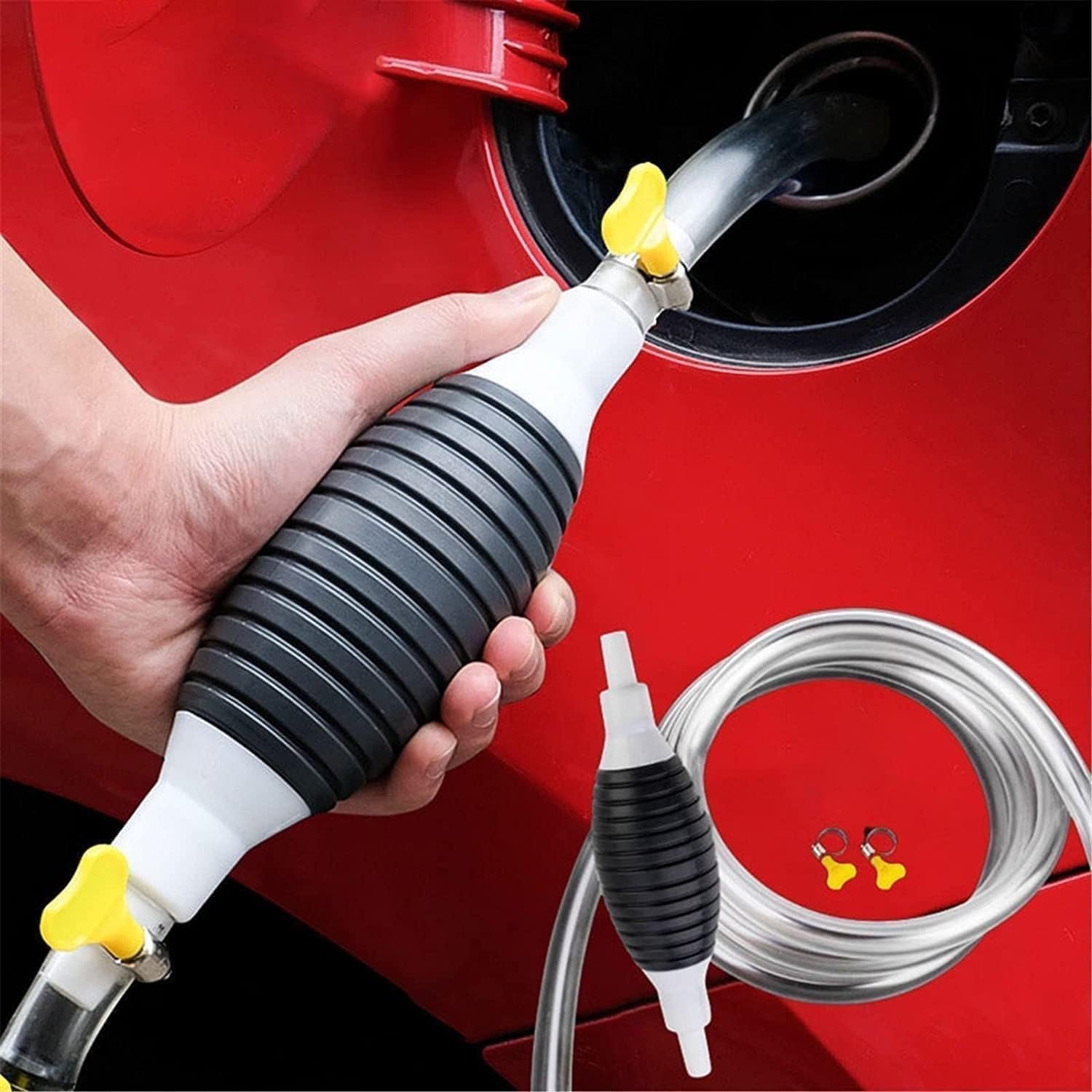 Manual fuel transfer pump siphoning petrol from a container