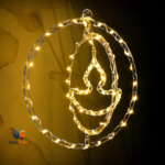Close-up of warm white LED diya-shaped light