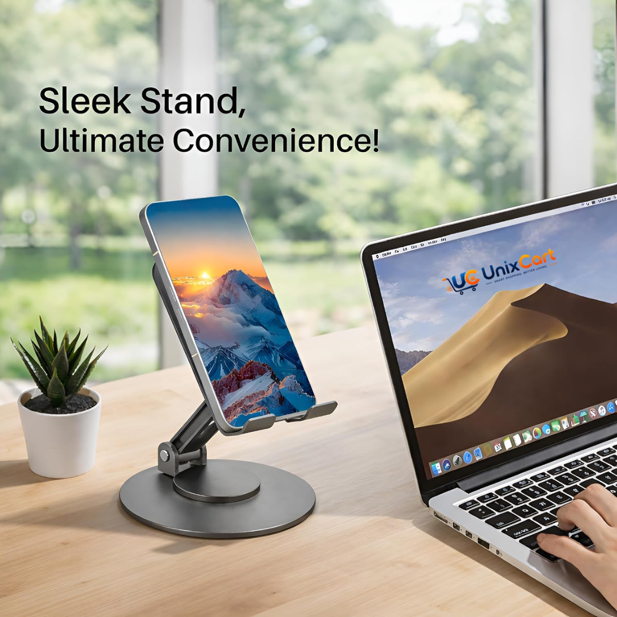 Smartphone mounted on 360 rotating metal mobile stand during video conference on office desk