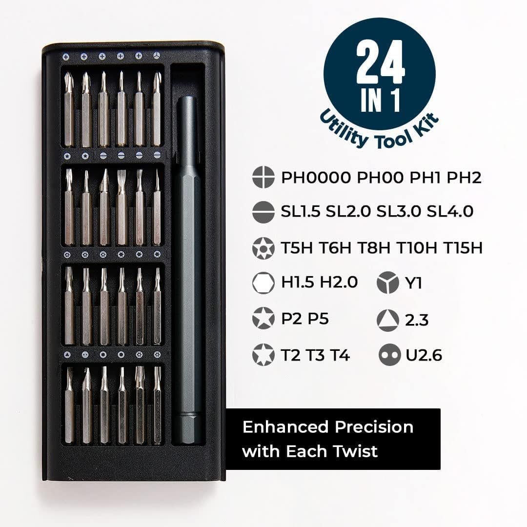 Screwdriver kit being used on laptop screws